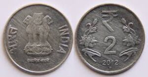 Rupee gains against dollar